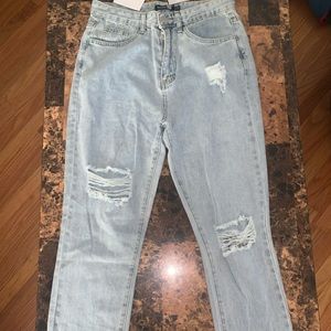 Ripped knee distressed straight leg jeans UK SIZE